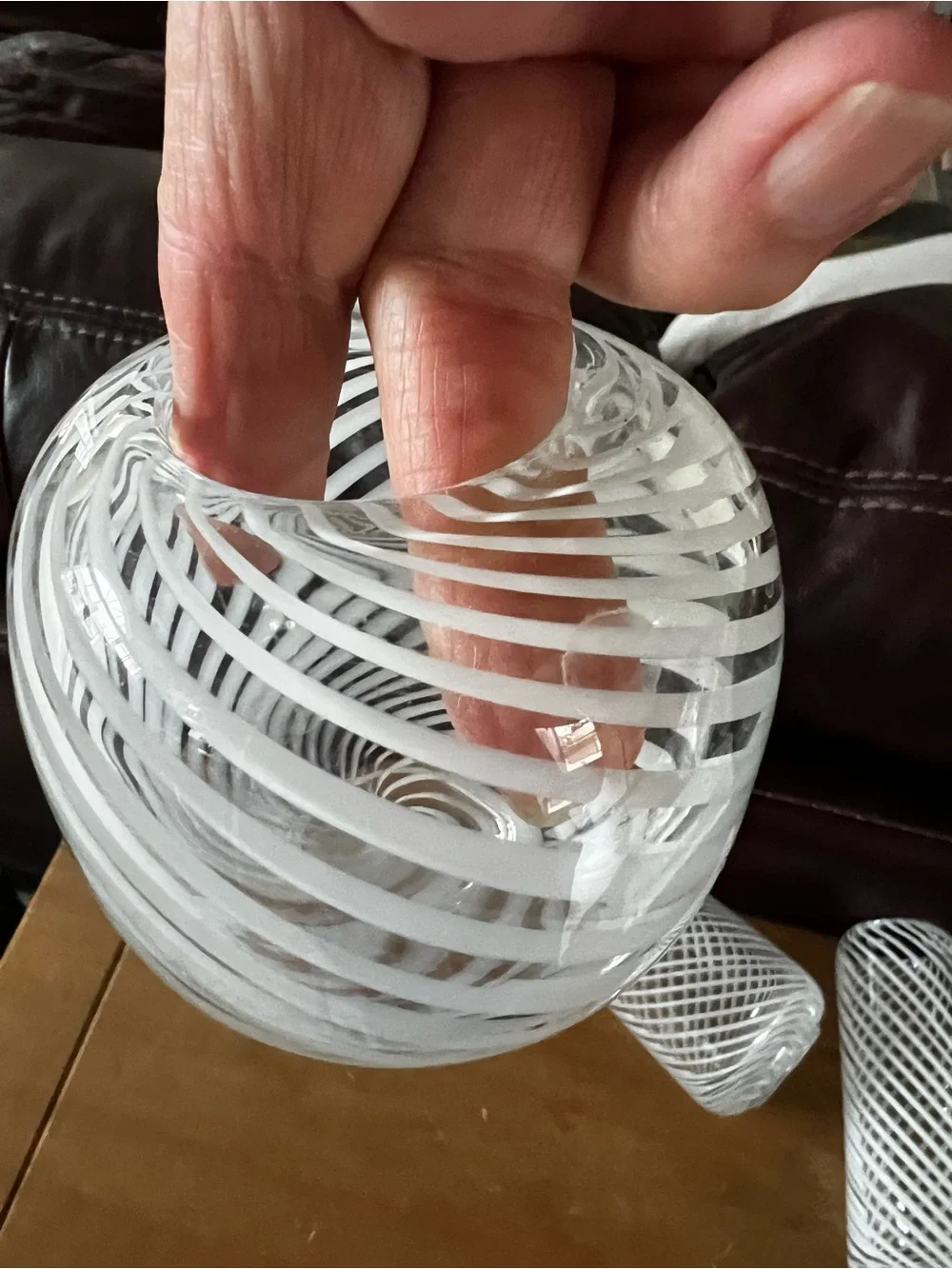 Set of three hand blown vases. Beautiful with white swirls.